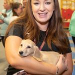 Rice Lane staff smiled as they held their new furry friends