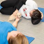 Rice Lane staff were able to cuddle with the puppies during the yoga session
