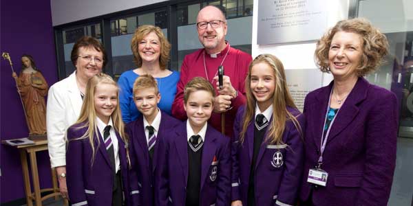 Back row: Joan Stein (chair of governors), deputy mayor of Liverpool Cllr Anne O’Byrne, Paul Bayes, Bishop of Liverpool. Front row: Quadruplets Abbey, Joel, Reece and Megan Diggle with Mrs Benson (headteacher).
