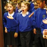 Younger pupils sang and danced for the visitors