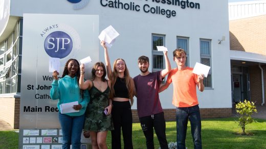 A group of St John Plessington Catholic College students celebrating their results