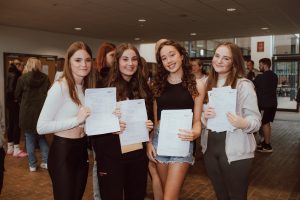 Rainford High students Mya, Caitlin, Holly with GCSE results