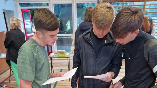 Maricourt students looking at their GCSE results