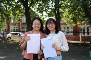 Serena Tang (left) and Jasmine Law from St Mary's Crosby who achieved excellent results. They arrived in the UK from Hong Kong two years ago.