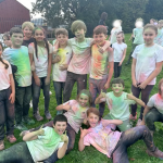 St Gabriels pupils pose for a photo covered in colours!