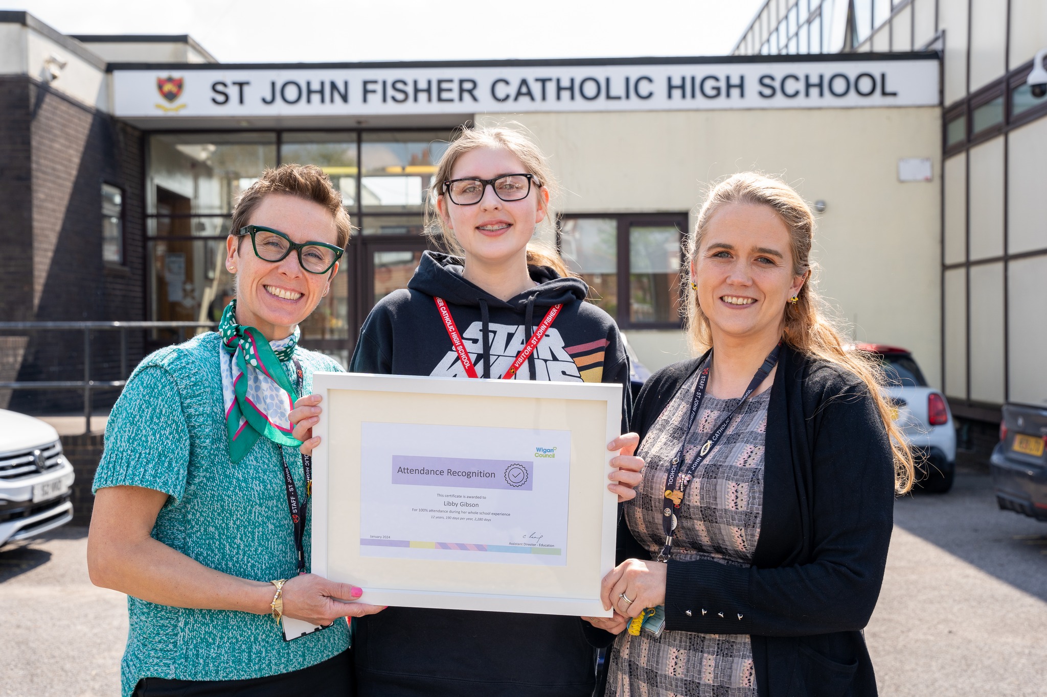 Student who has never missed school presented with award from Wigan ...