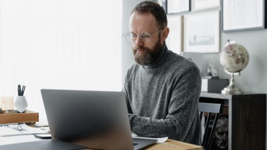 Man on computer at desk