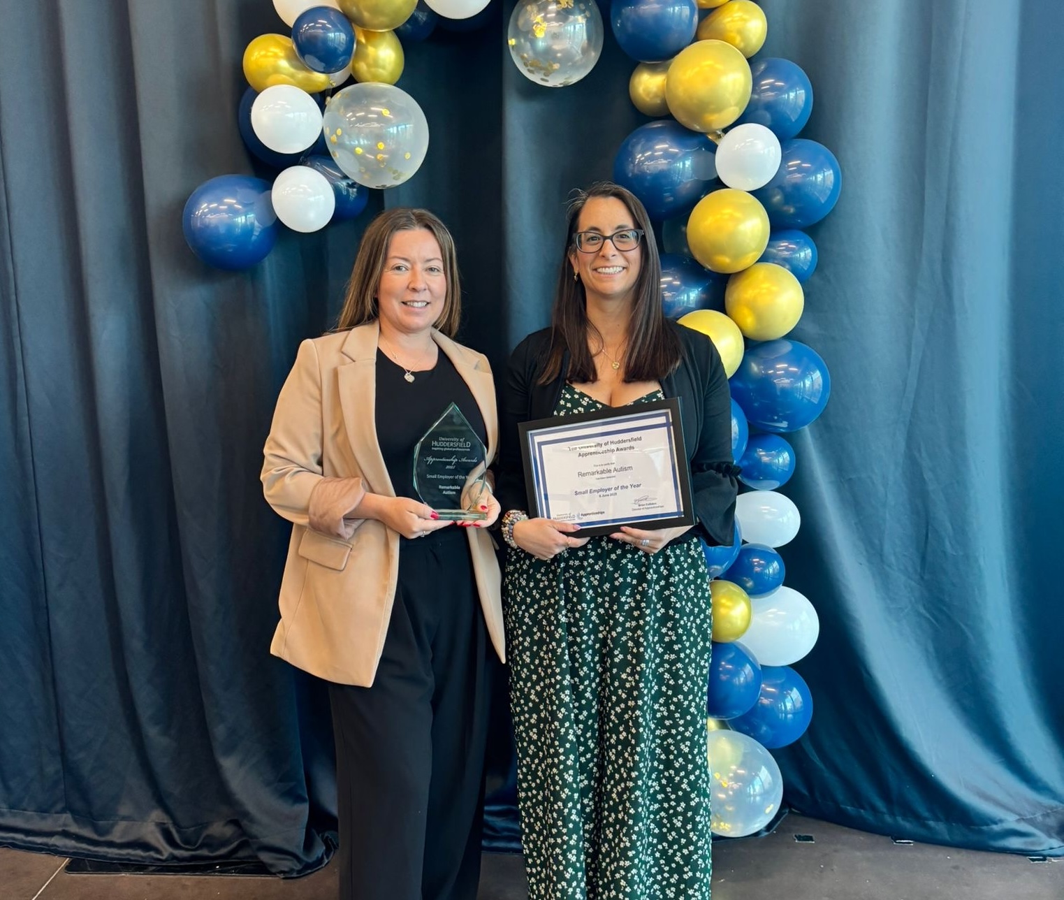 Remarkable Autism Charity and Sundial Therapy collecting their award. From left to right: Clare Meighen, people and culture manager at Remarkable Autism, and Susie Grubert, Head of therapy and clinical services at Sundial Therapy
