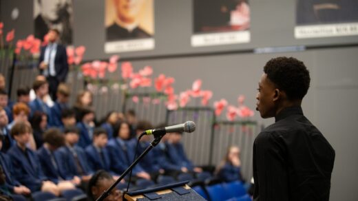 Caleb Likambi inspiring Year 10 students at St John Plessington Catholic College